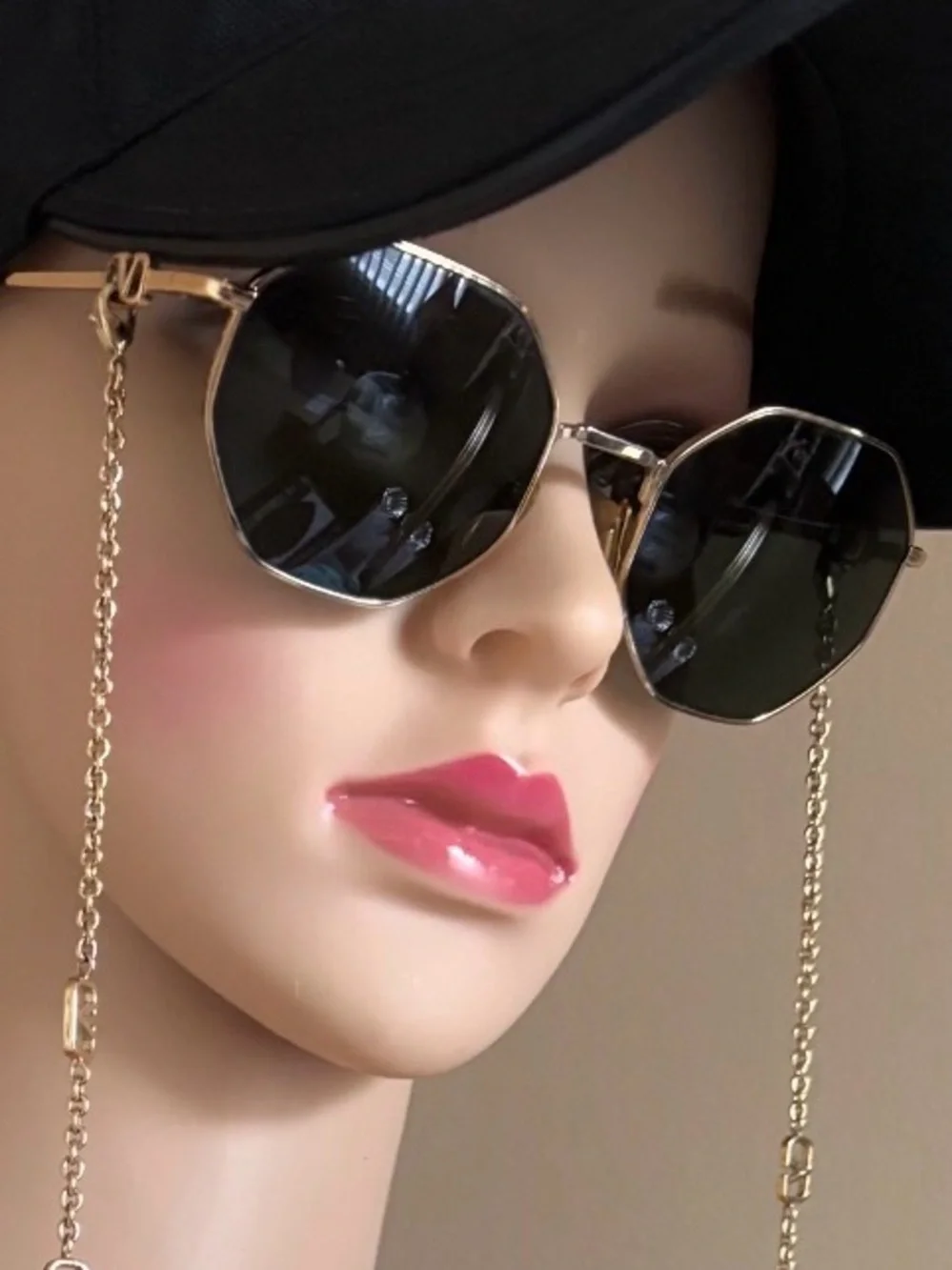 Valentino Garavani Octagonal Metal Sunglasses with a gold Vlogo chain